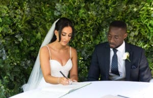 Bride signing the register