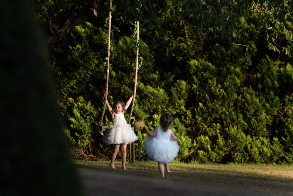 Children playing on swing