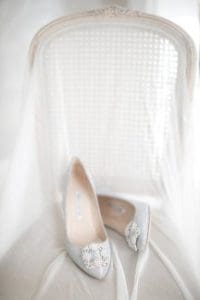 Brides wedding heels on a chair