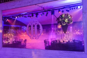 Outdoor wedding reception with disco lights