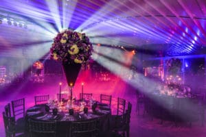 Outdoor wedding reception with disco lights