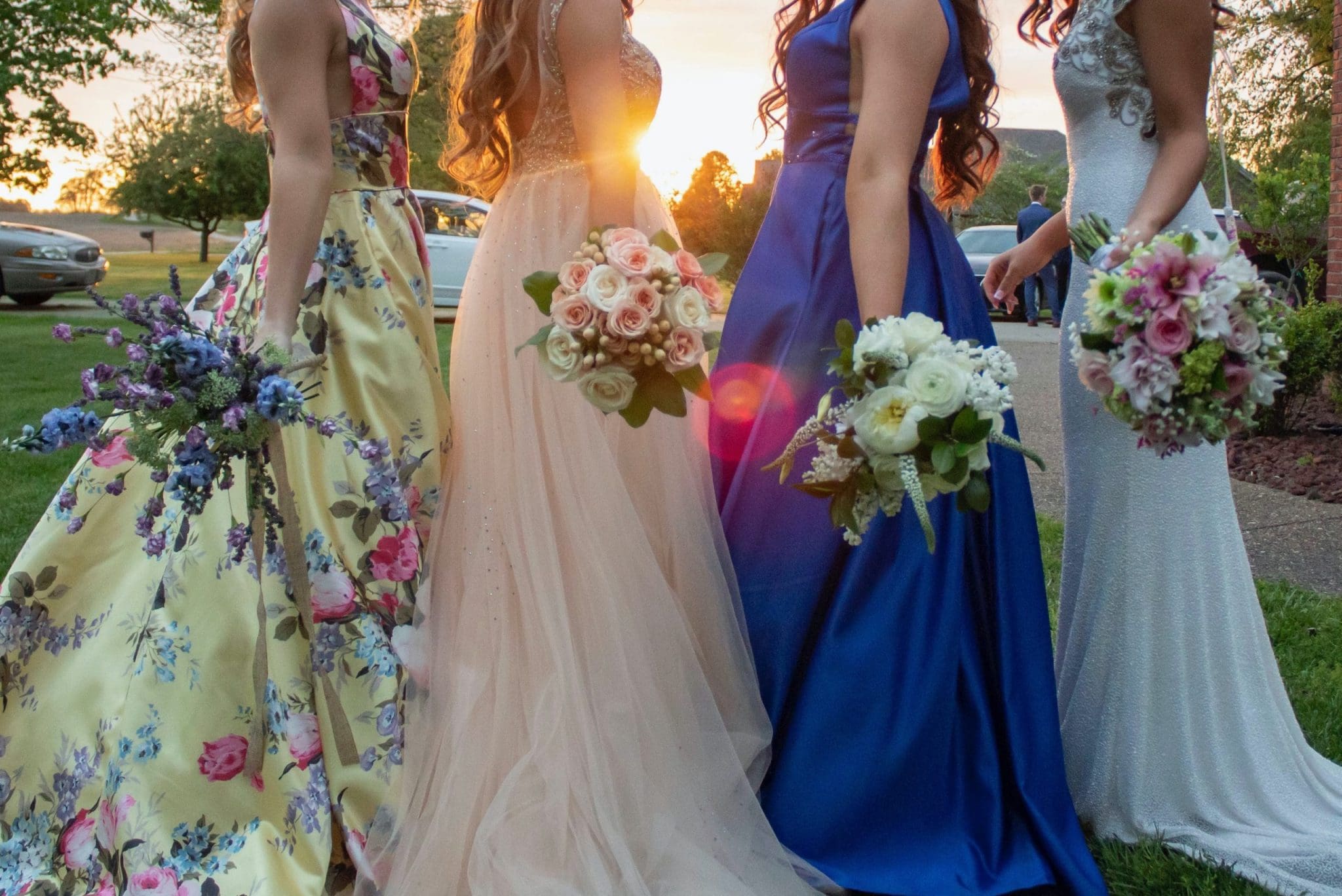 Bridesmaids dresses with flower bouquets