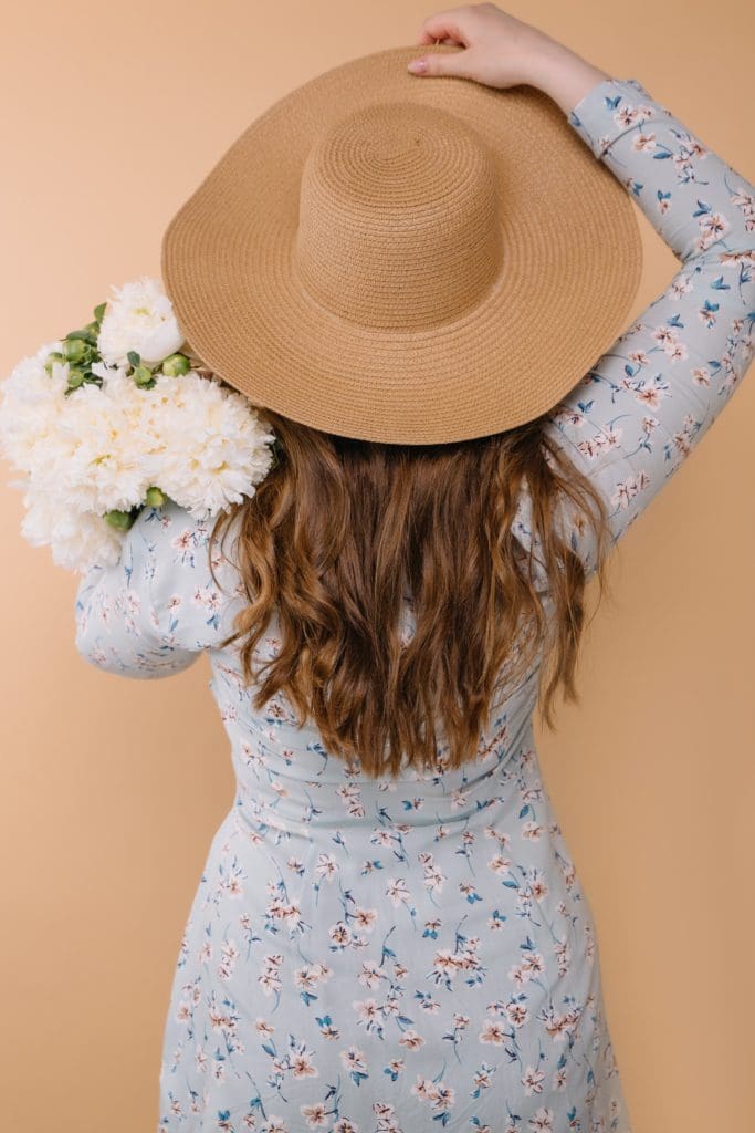 Floral dress, hat and flowers