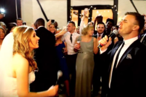 Gary Barlow singing at a wedding