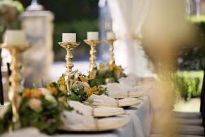 Dressed wedding table with candles and flowers