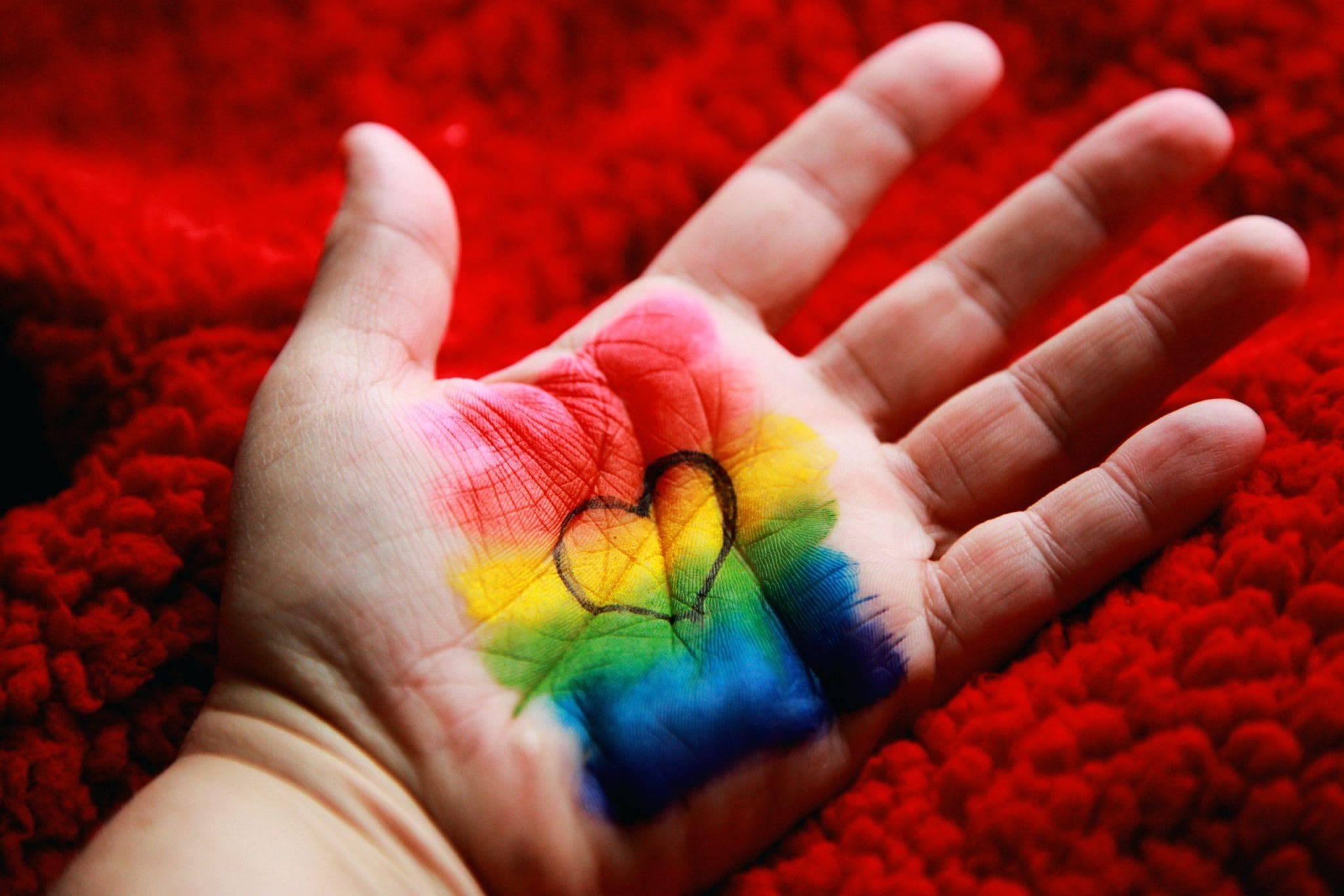 Gay rainbow love hand