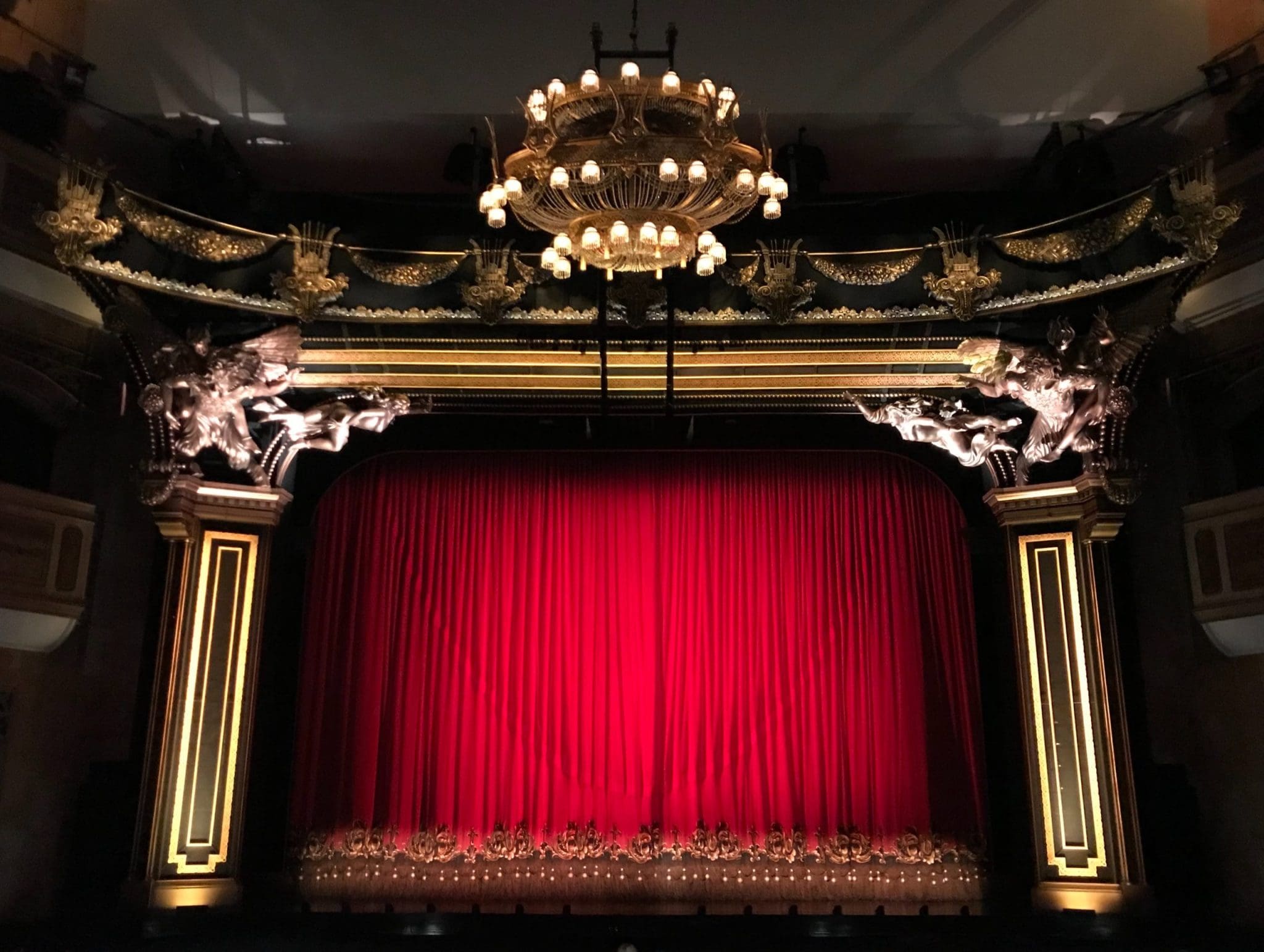 Red curtain on a theatre stage