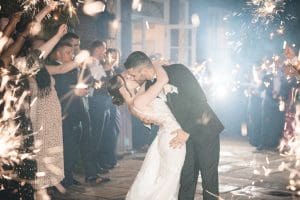 bride & grooms first kiss at Delamere Manor Wedding