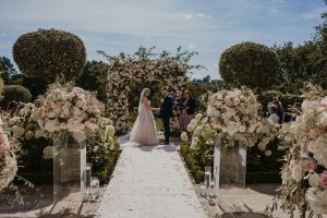 Couple getting married on the Terrace at Delamere Manor