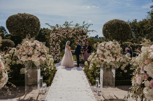 Couple getting married on the Terrace at Delamere Manor